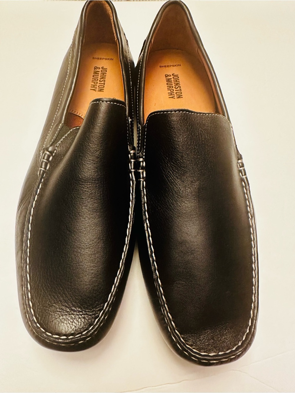 Johnston & Murphy Black Leather Slip-On Loafers with White Stitching